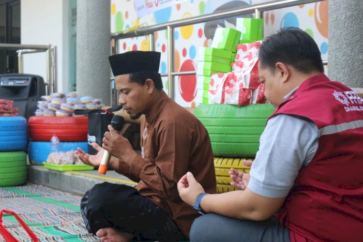 Muharram Ceria “Berbagi bingkisan untuk anak yatim dan berlibur bersama”